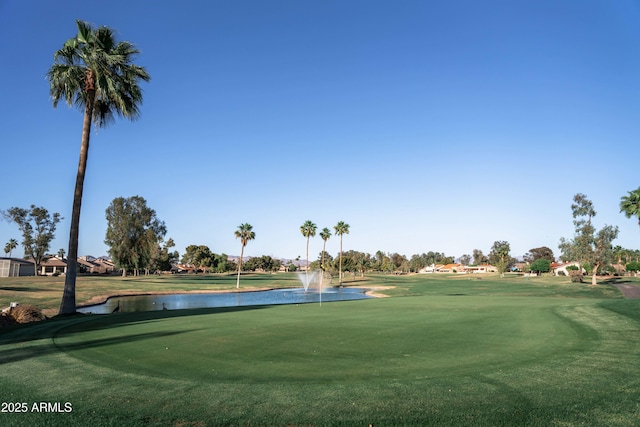 view of community featuring a water view and golf course view