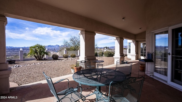 view of patio with a mountain view