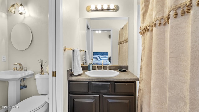 bathroom with sink and toilet