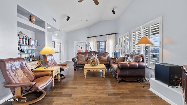 living room with ceiling fan, lofted ceiling, and dark wood-type flooring