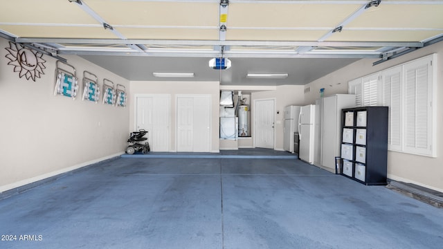 garage featuring a garage door opener and white fridge