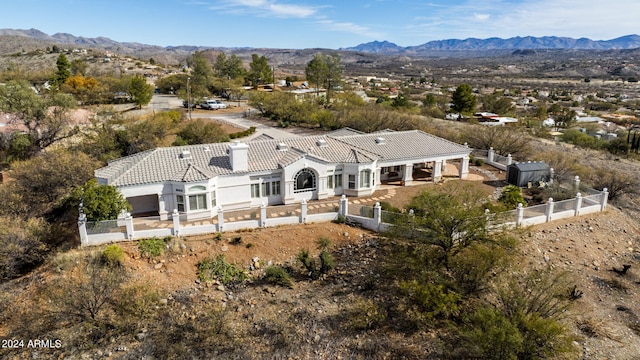 drone / aerial view featuring a mountain view