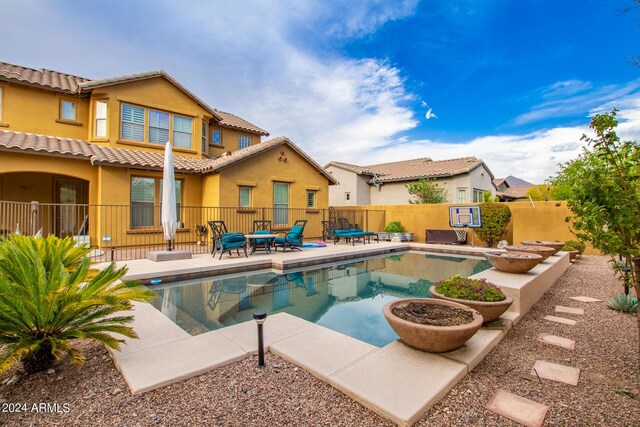 view of pool featuring a patio area