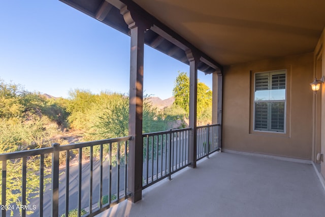 balcony featuring a mountain view