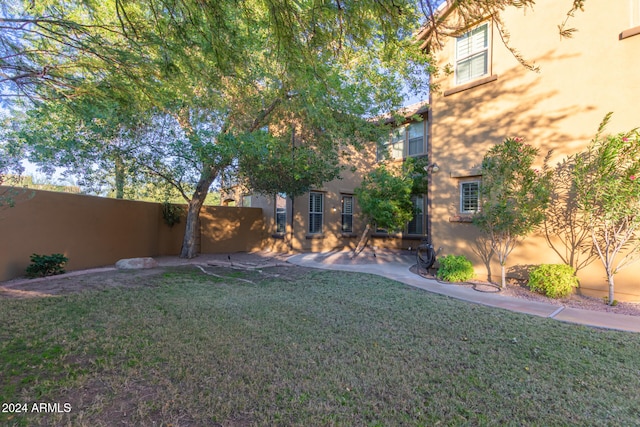 view of yard featuring a patio and fence