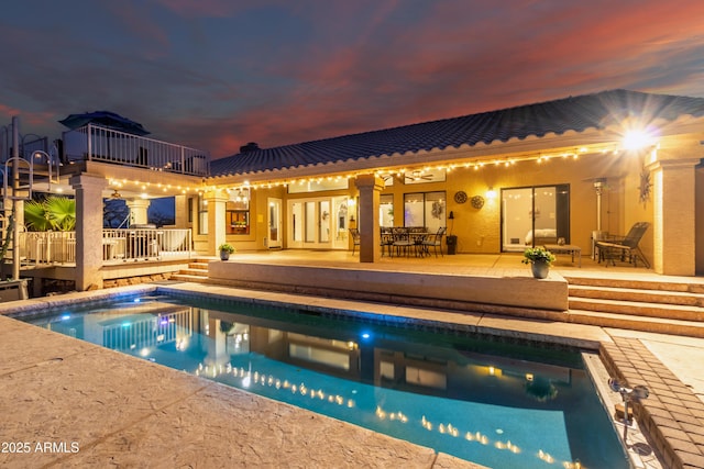 pool with a patio