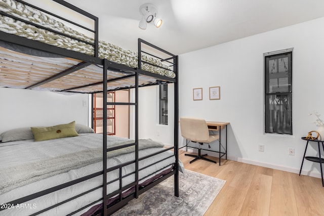 bedroom featuring light hardwood / wood-style floors