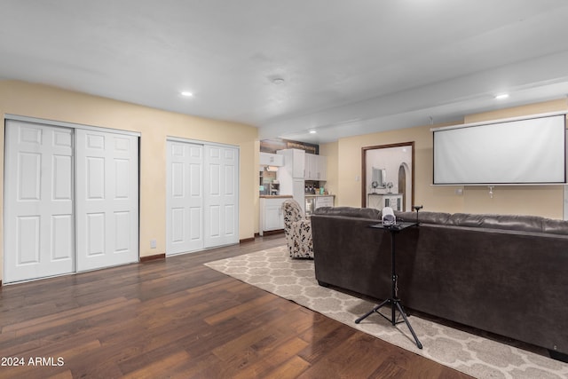 home theater featuring wood-type flooring