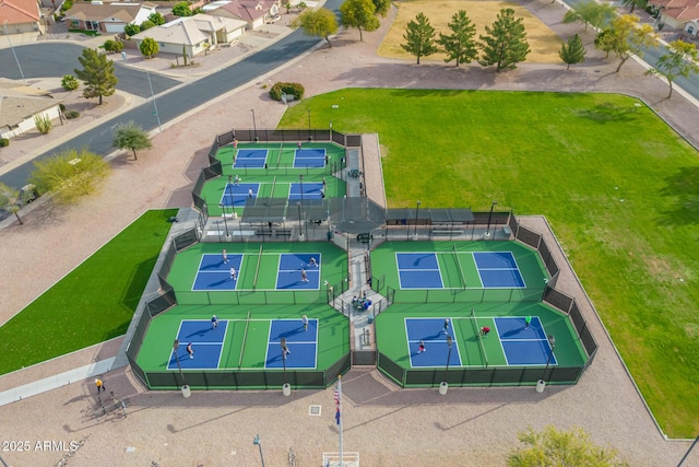 birds eye view of property with a residential view