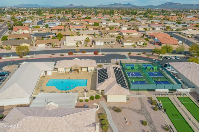 birds eye view of property with a residential view and a mountain view