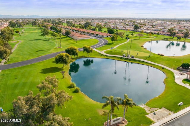 bird's eye view with a water view, a residential view, and golf course view