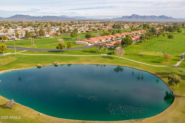 aerial view featuring a residential view, golf course view, and a water and mountain view