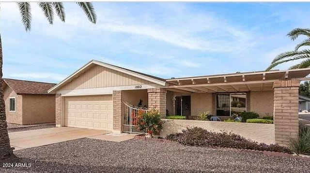 ranch-style house featuring a garage