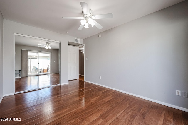 interior space with wood-type flooring and ceiling fan