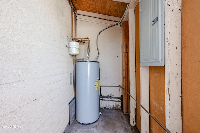 utilities with water heater and electric panel