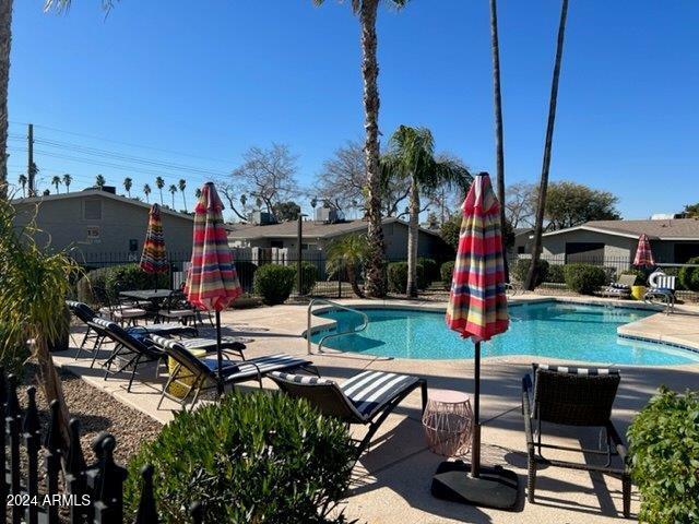 view of swimming pool featuring a patio