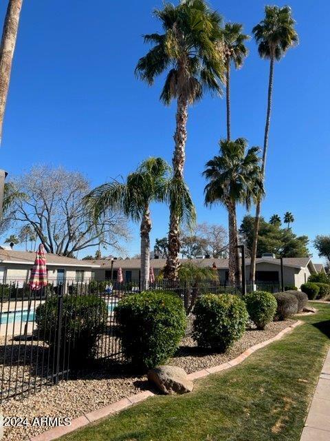 view of yard featuring a community pool