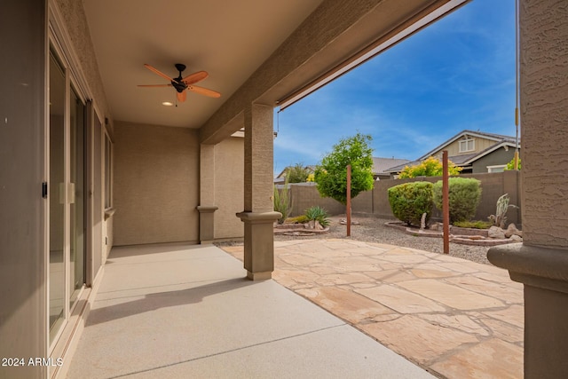 view of patio with ceiling fan