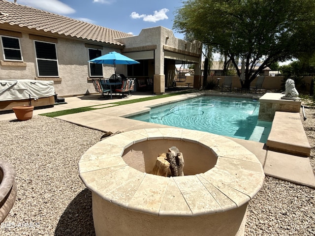view of swimming pool featuring a patio area and a fenced backyard