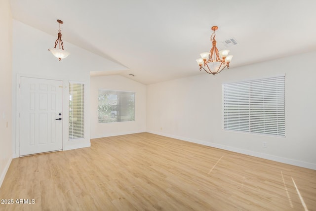 29900 N Maravilla Dr, San Tan Valley, AZ 85143 - foyer with visible vents, lofted ceiling, light wood-style floors, an inviting chandelier, and baseboards