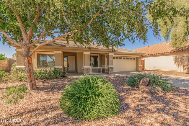 29900 N Maravilla Dr, San Tan Valley, AZ 85143 - ranch-style home with concrete driveway, a tile roof, stucco siding, stone siding, and an attached garage