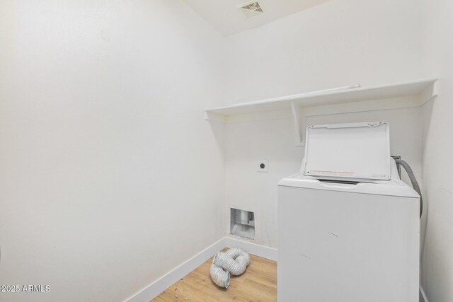 29900 N Maravilla Dr, San Tan Valley, AZ 85143 - laundry area with visible vents, baseboards, laundry area, wood finished floors, and washer / clothes dryer