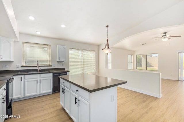 29900 N Maravilla Dr, San Tan Valley, AZ 85143 - kitchen with a sink, black appliances, white cabinets, light wood-style floors, and dark countertops