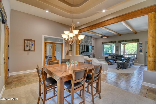 dining space featuring light tile patterned floors, baseboards, ceiling fan with notable chandelier, and recessed lighting
