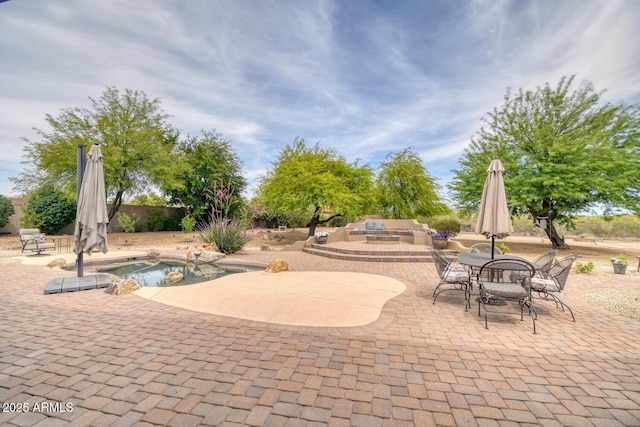 view of patio / terrace with fence