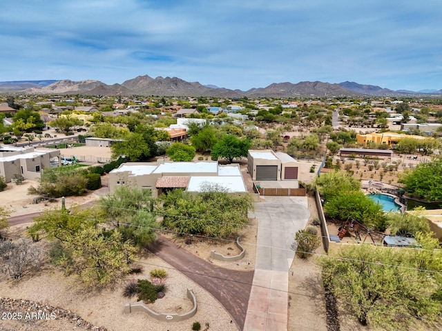 drone / aerial view with a residential view and a mountain view