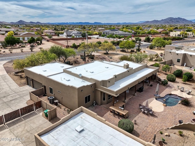 aerial view with a residential view and a mountain view