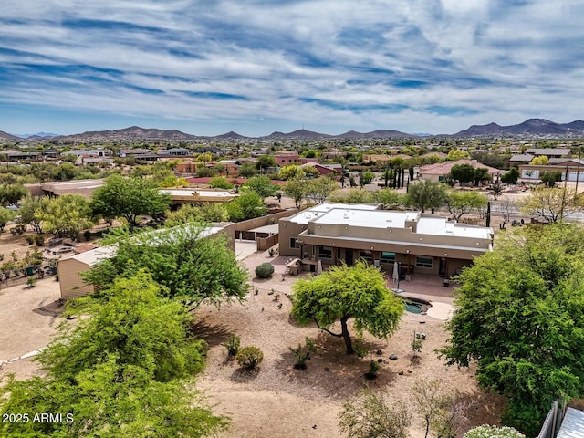 birds eye view of property featuring a mountain view and a residential view