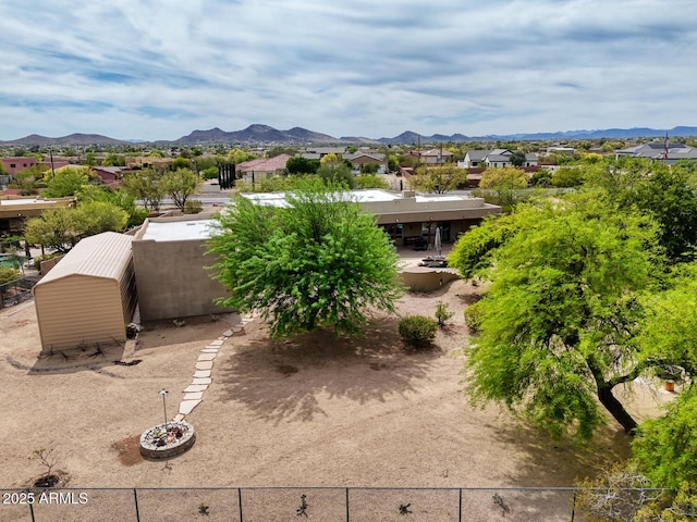 exterior space featuring a mountain view and a residential view