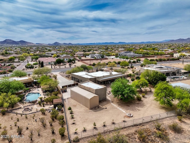 drone / aerial view featuring a mountain view and a residential view
