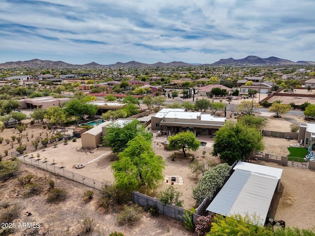 birds eye view of property with a residential view and a mountain view