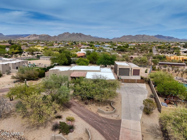 drone / aerial view with a residential view and a mountain view