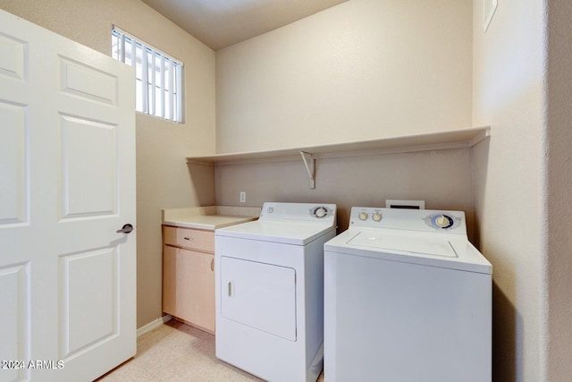 clothes washing area with laundry area and washing machine and clothes dryer