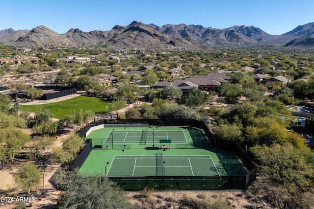 birds eye view of property featuring a mountain view