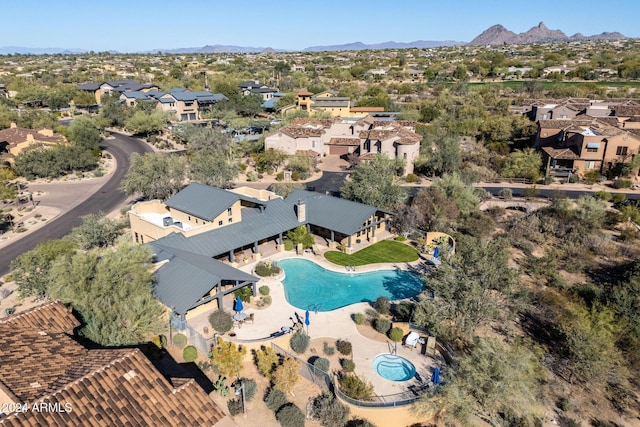 birds eye view of property with a residential view and a mountain view