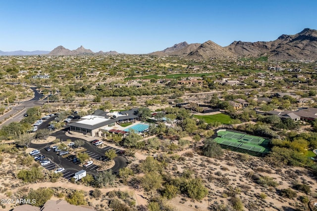 birds eye view of property featuring a mountain view