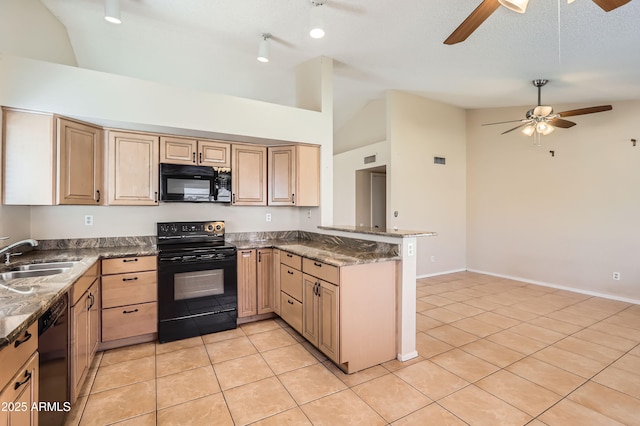 kitchen featuring light brown cabinets, black appliances, a sink, a ceiling fan, and a peninsula