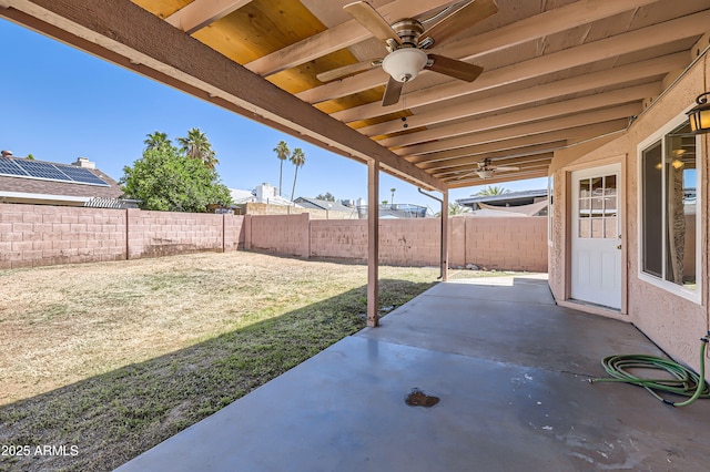 view of patio / terrace with ceiling fan and a fenced backyard