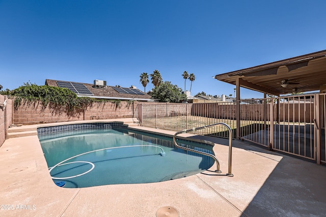 view of pool featuring a fenced in pool, cooling unit, a patio, and a fenced backyard