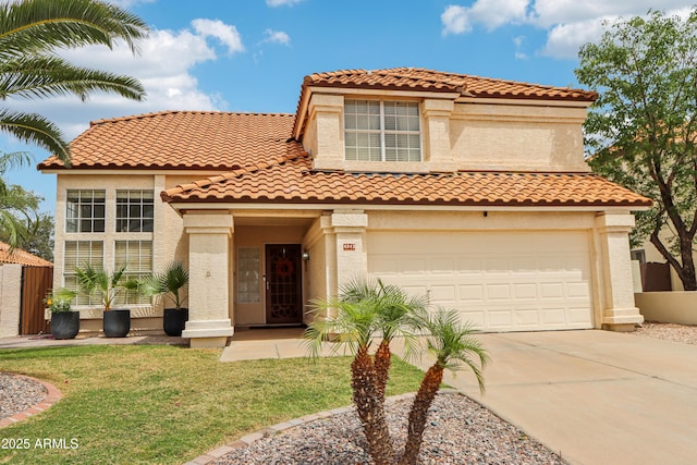 mediterranean / spanish home with concrete driveway, stucco siding, and a front lawn