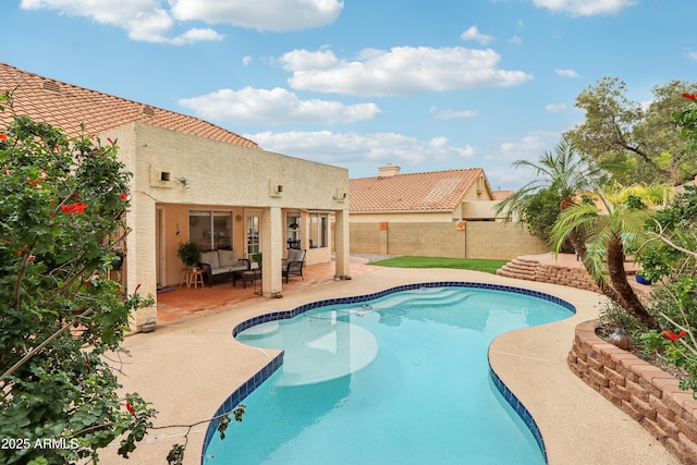 view of swimming pool with a patio, a fenced backyard, and an outdoor hangout area
