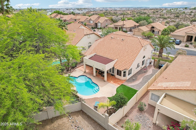 aerial perspective of suburban area with a pool area