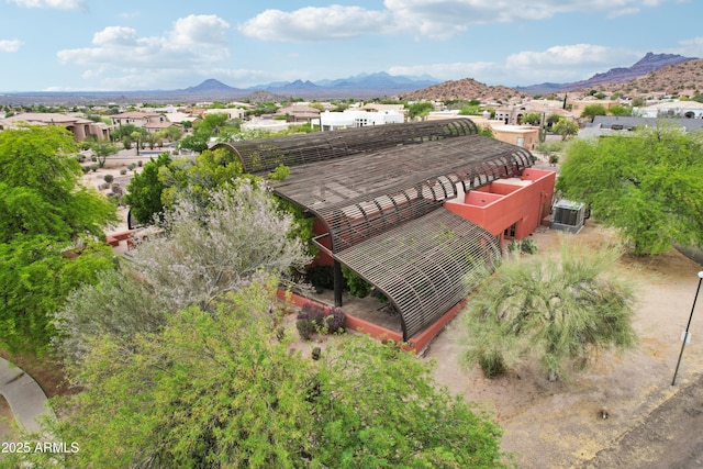 aerial perspective of suburban area with a mountain backdrop