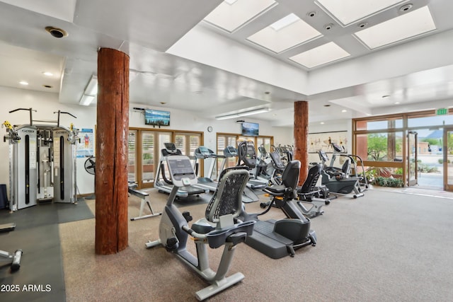 workout area with recessed lighting and ornate columns