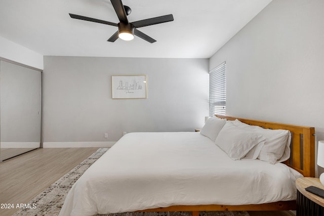 bedroom featuring ceiling fan and wood-type flooring