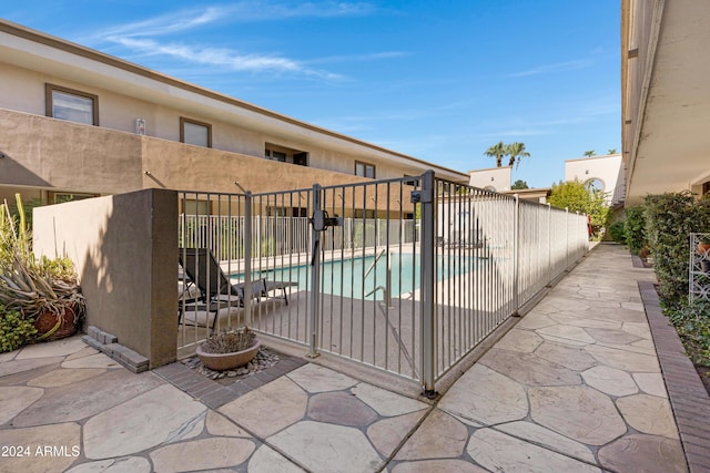 view of pool with a patio area